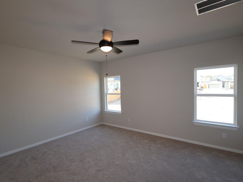 Spacious, unfurnished interior of a new home in Heritage, Dripping Springs (Image 15).