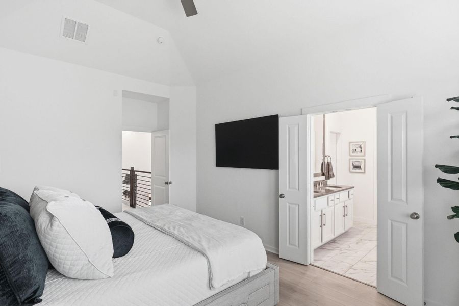 Furnished interior view inside a new home in Bridgeland Central, Cypress (Image 9).