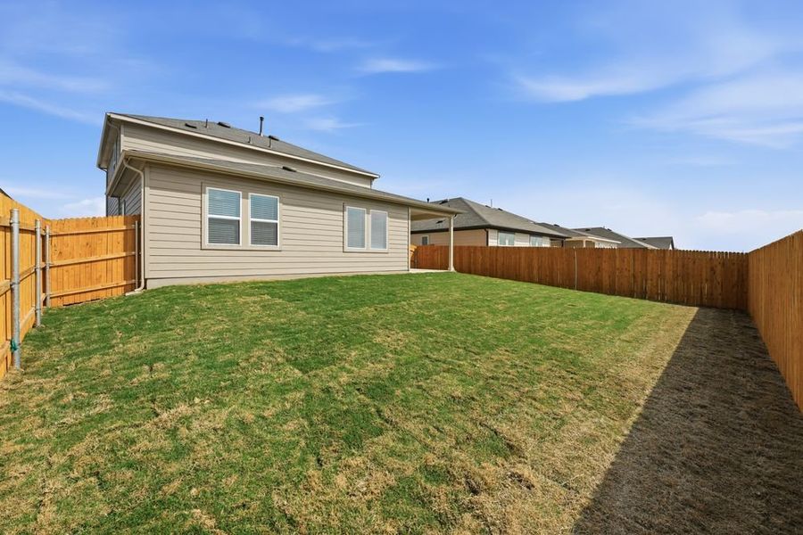 Exterior details and patio area of a home in Longview, Del Valle (Image 15).