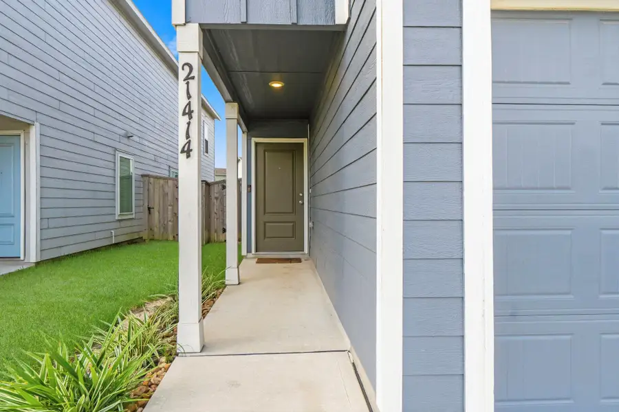 Exterior details and patio area of a home in Tavola, New Caney (Image 22).
