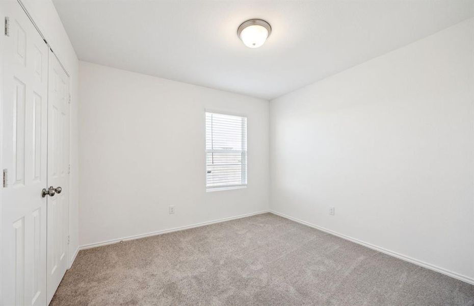 Inviting bedroom offering soft natural light Inviting bedroom offering soft natural light