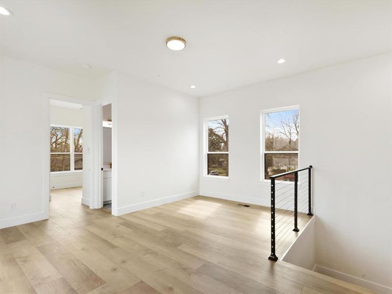 Game room overlooking the 4th bedroom.