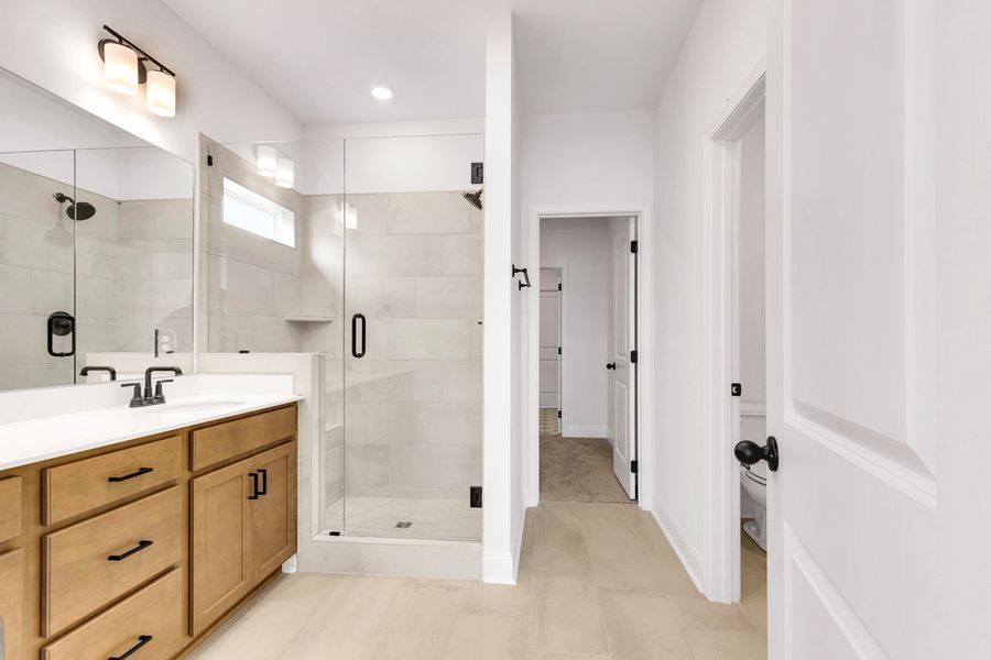 Representative furnished interior of a home built from the Titusville II by Regent Homes in Marlon's Creek, Spring Hill (Image 10).
