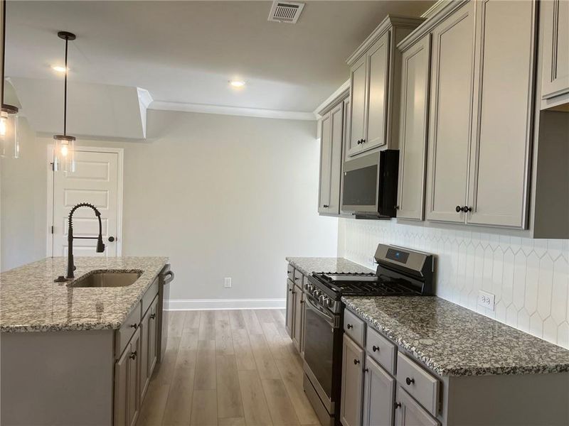 Furnished interior view inside a new home in Crofton Place Enclave, Snellville (Image 7). Furnished interior view inside a new home in Crofton Place Enclave, Snellville (Image 7).