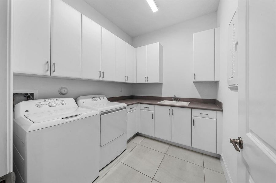 Laundry Rm Has Storage & Folding Counter Laundry Rm Has Storage & Folding Counter