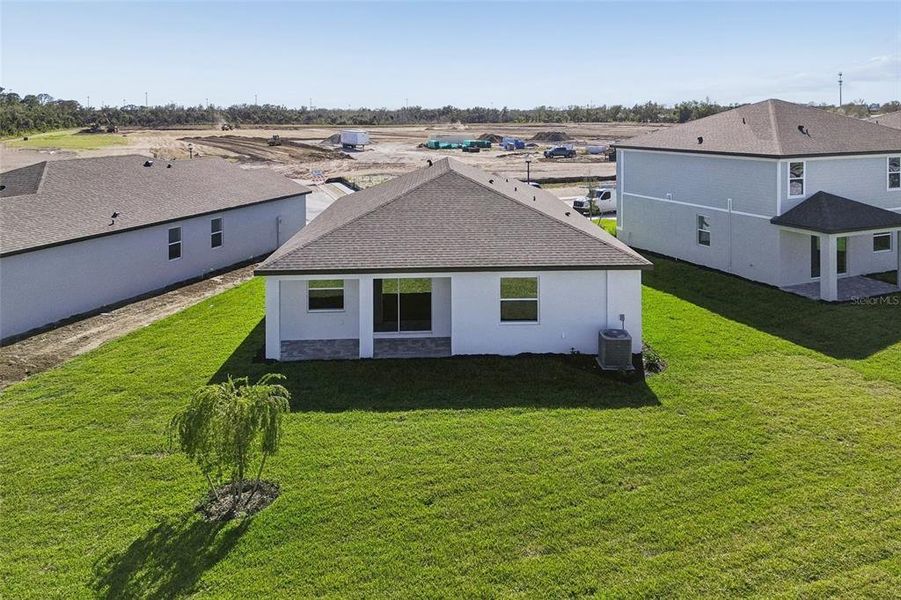 Exterior details and patio area of a home in Southpointe, Palmetto (Image 3).