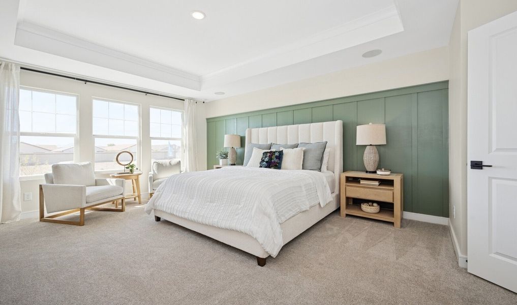 Primary suite with decorative feature wall