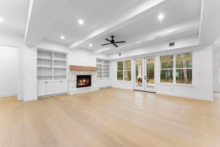 The beautiful rock fireplace is the focal point of the family room.