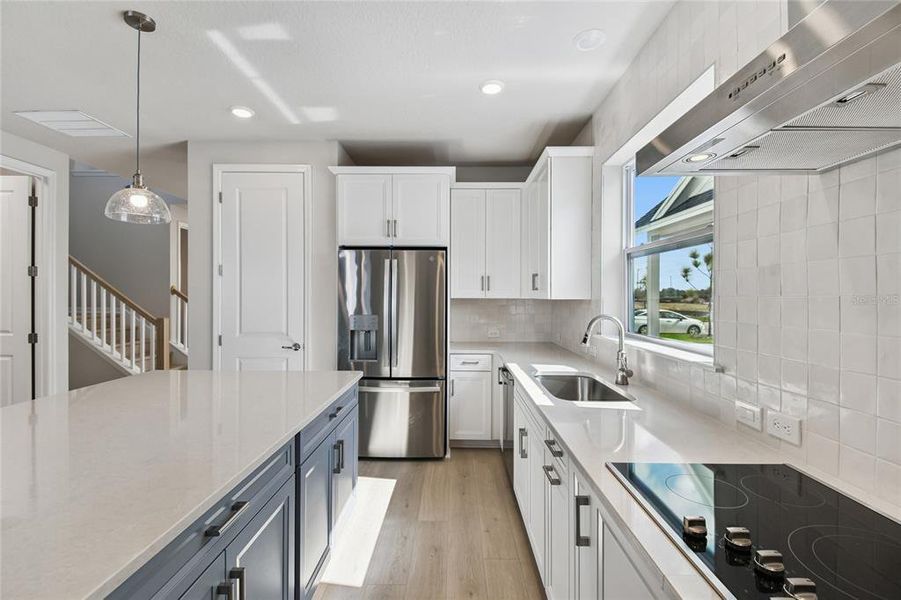 Furnished interior view inside a new home in Weslyn Park in Sunbridge 34', St. Cloud (Image 11).