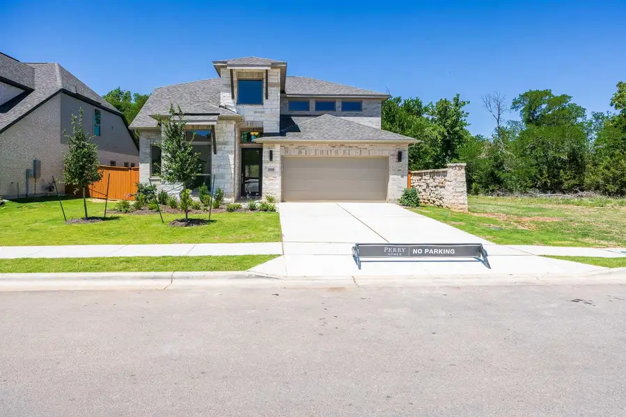 View of front of property featuring driveway, an attached garage, fence, a front yard, and roof with shingles View of front of property featuring driveway, an attached garage, fence, a front yard, and roof with shingles
