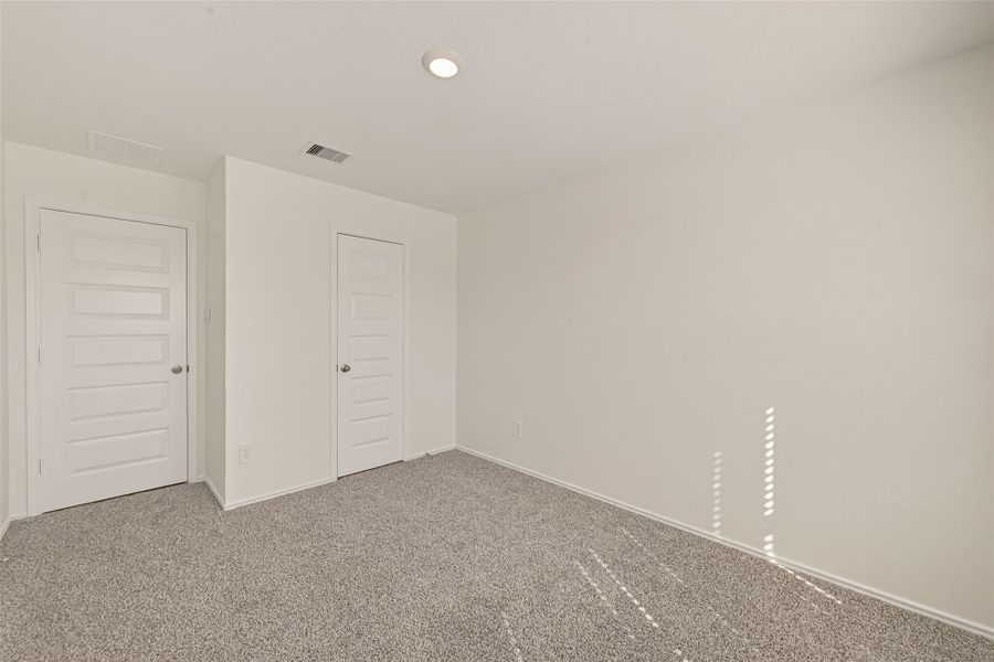 Spacious, unfurnished interior of a new home in Windstone on the Prairie, Richmond (Image 41).