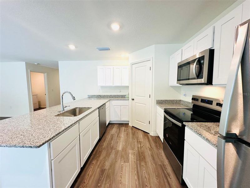 Furnished interior view inside a new home in , Port Charlotte (Image 7).