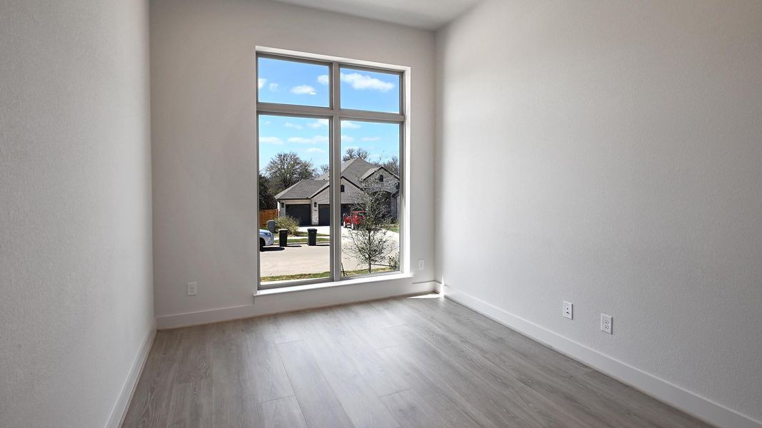 Spacious, unfurnished interior of a new home in 6 Creeks, Kyle (Image 27).