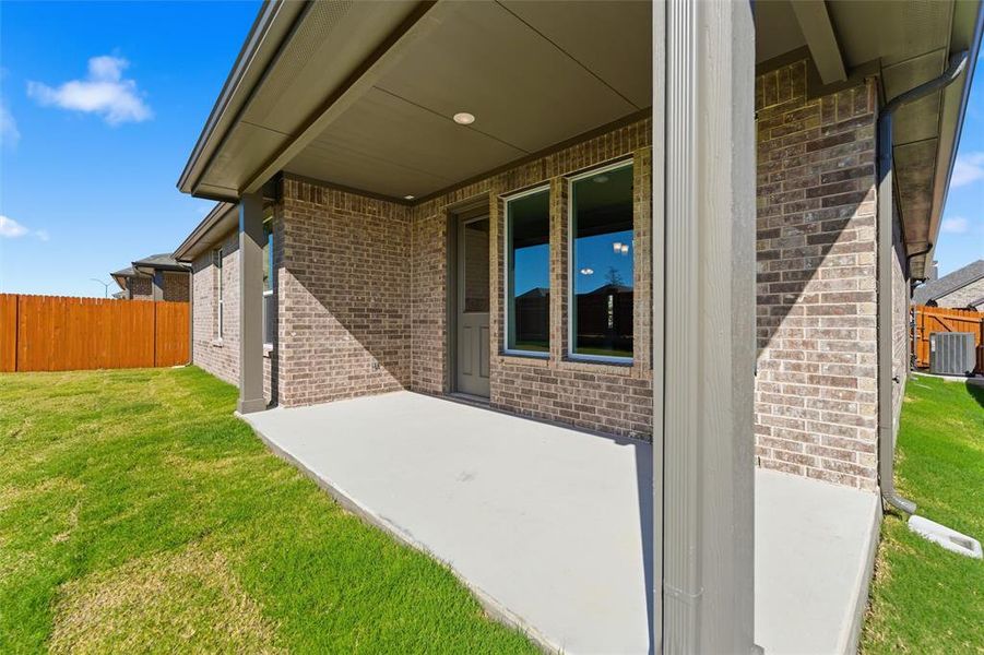 Exterior details and patio area of a home in Northstar, Haslet (Image 26).