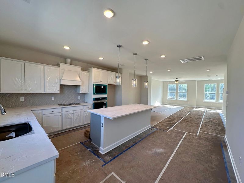 In-progress construction of a new home in Forestville Yard Townhomes, Knightdale, NC (Image 12).