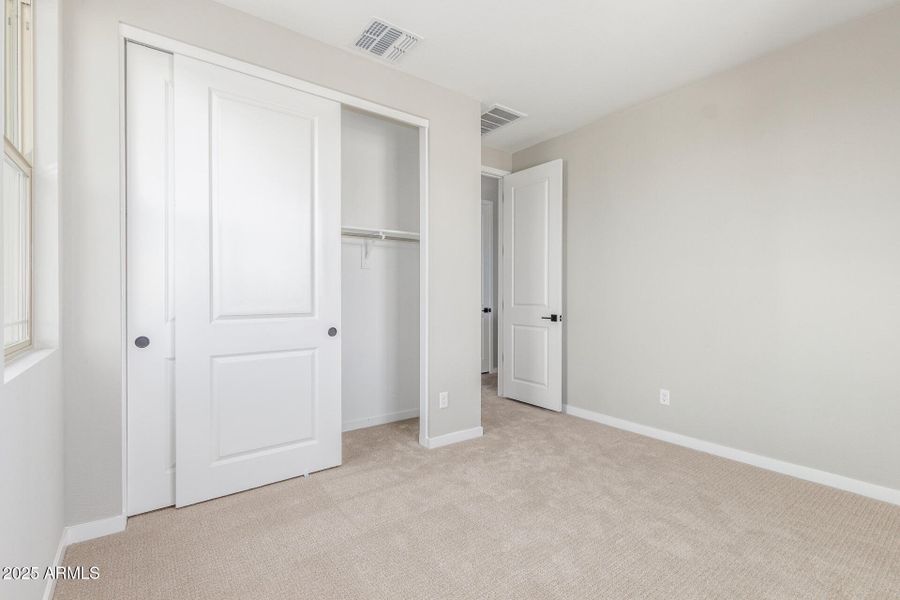 Bedroom 2 upstairs and closet