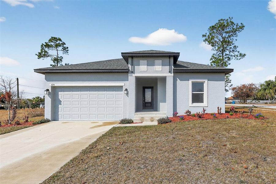 Front exterior of a new home in , Lake Hamilton, FL, highlighting curb appeal (Image 1). Front exterior of a new home in , Lake Hamilton, FL, highlighting curb appeal (Image 1).