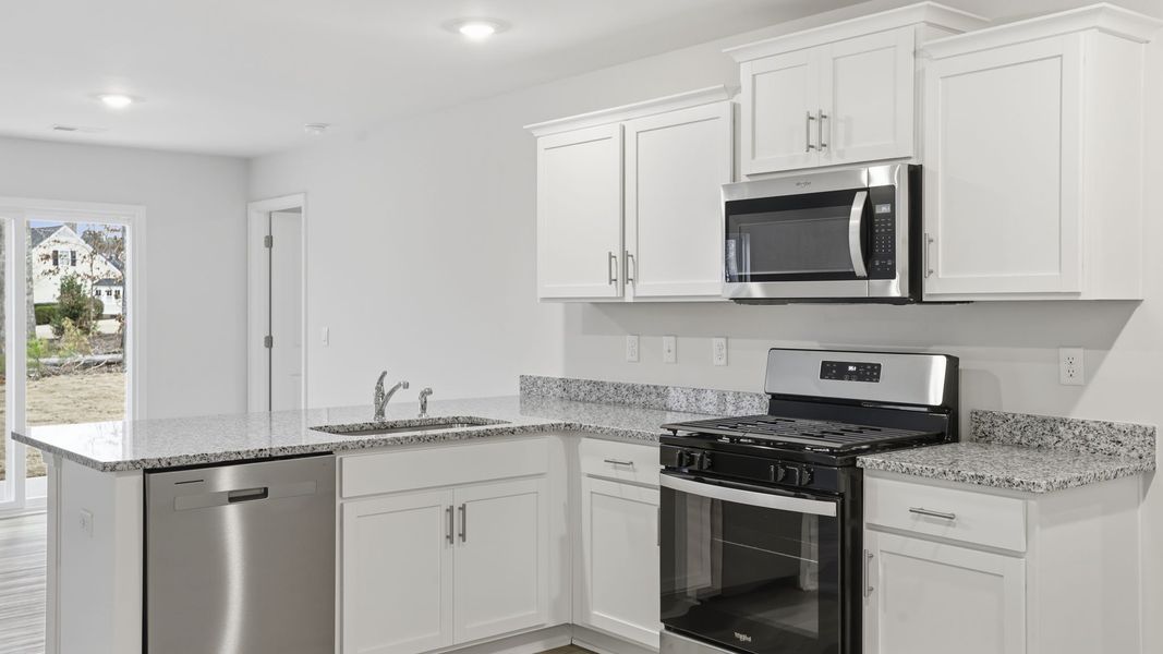 Furnished interior view inside a new home in Bentley Park, Greenwood (Image 9).