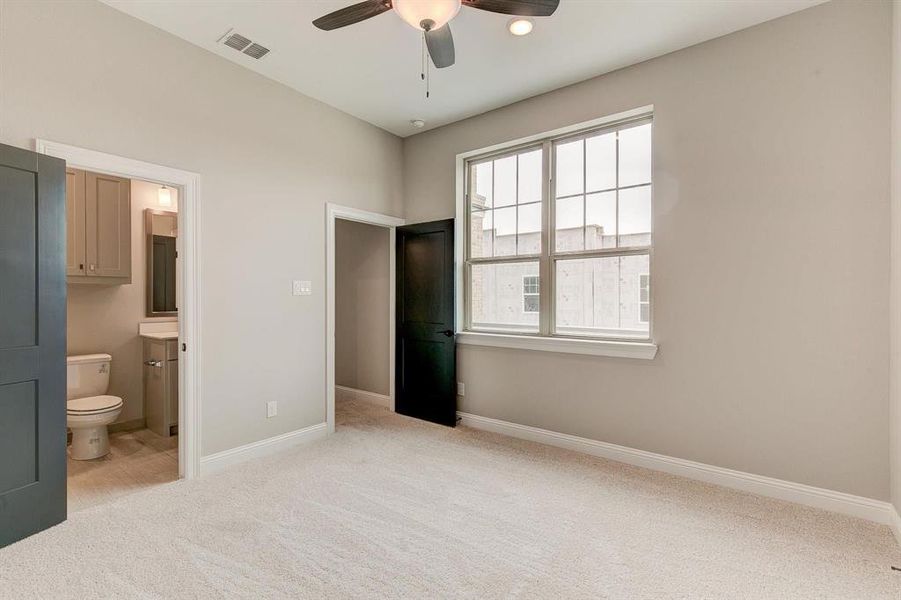 Representative Photo - secondary bedroom with ensuite bath