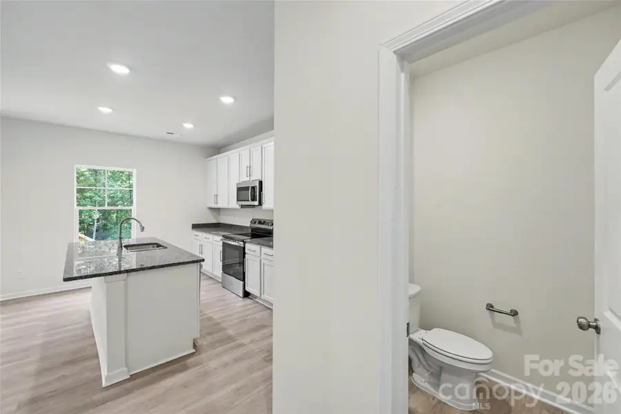 Furnished interior view inside a new home in , Iron Station (Image 7).