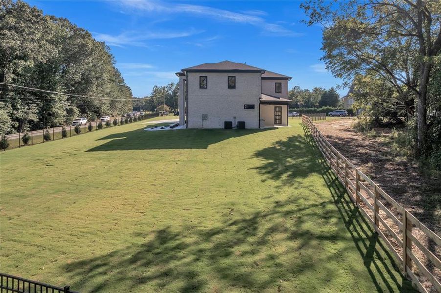 Front exterior of a new home in , Lawrenceville, GA, highlighting curb appeal (Image 2). Front exterior of a new home in , Lawrenceville, GA, highlighting curb appeal (Image 2).