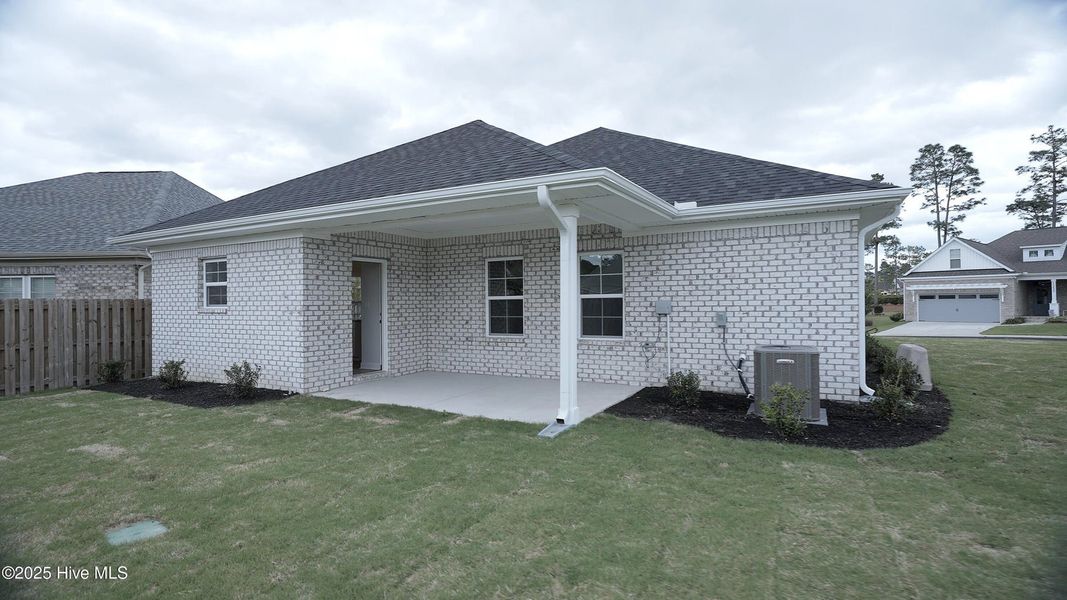 Front exterior of a new home in Palmetto Creek, Bolivia, NC, highlighting curb appeal (Image 18). Front exterior of a new home in Palmetto Creek, Bolivia, NC, highlighting curb appeal (Image 18).