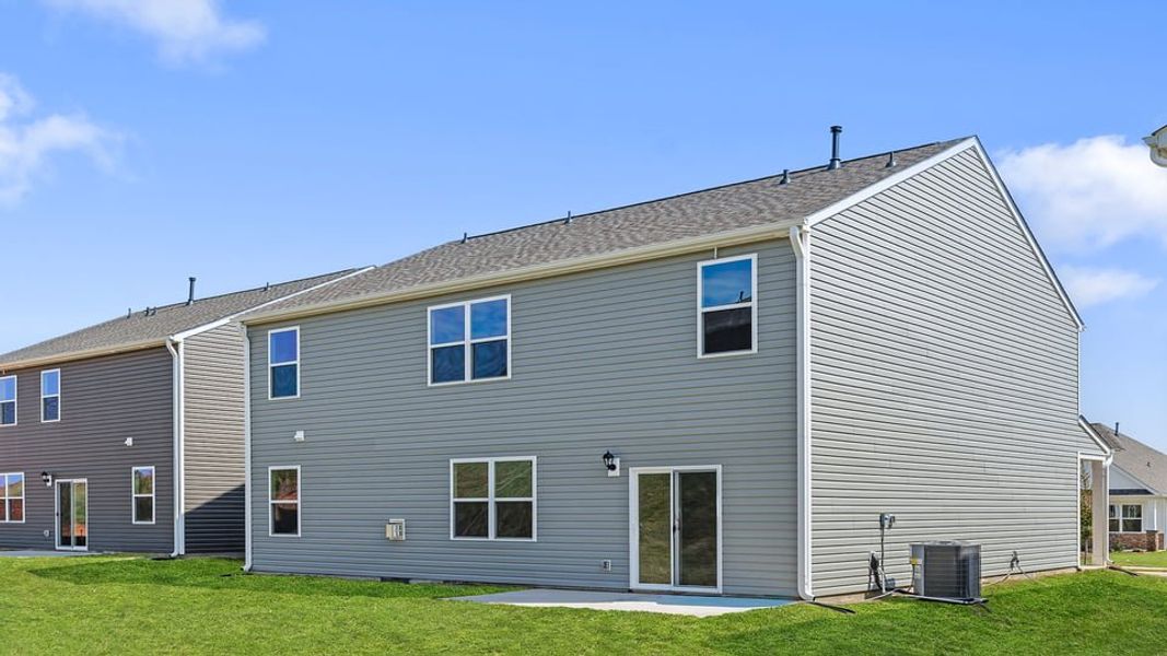 Exterior details and patio area of a home in Hunters Ridge, Woodruff (Image 22).