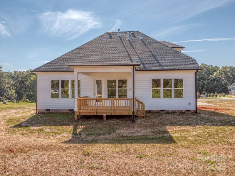 Front exterior of a new home in , Clover, SC, highlighting curb appeal (Image 24).