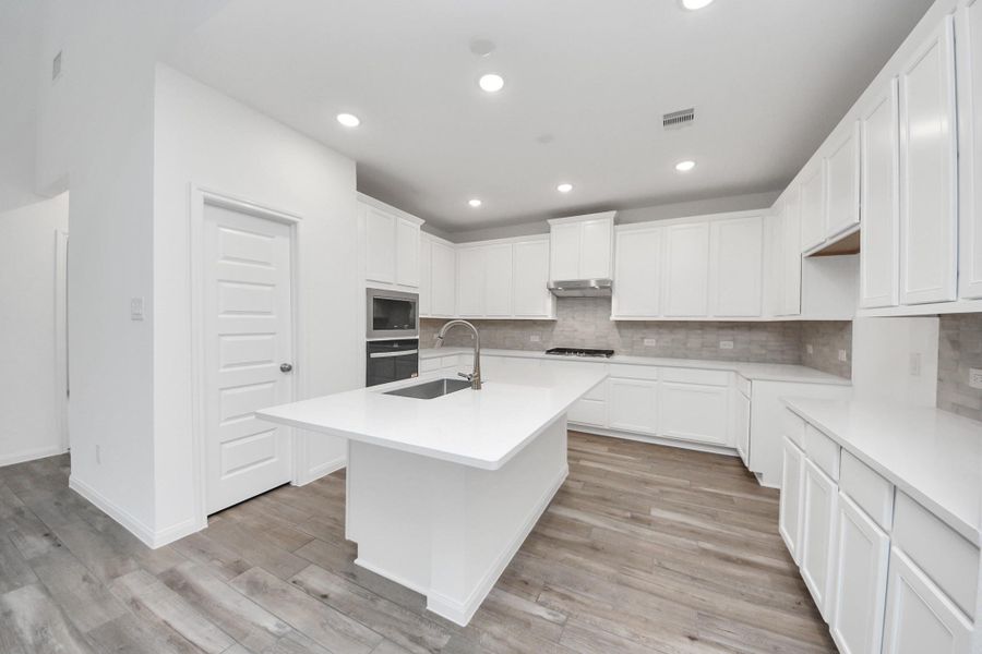 Furnished interior view inside a new home in Elyson, Katy (Image 12).