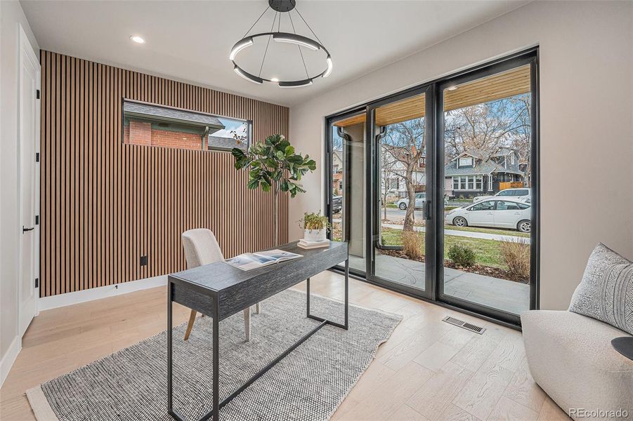 Handsome main floor study with front porch access