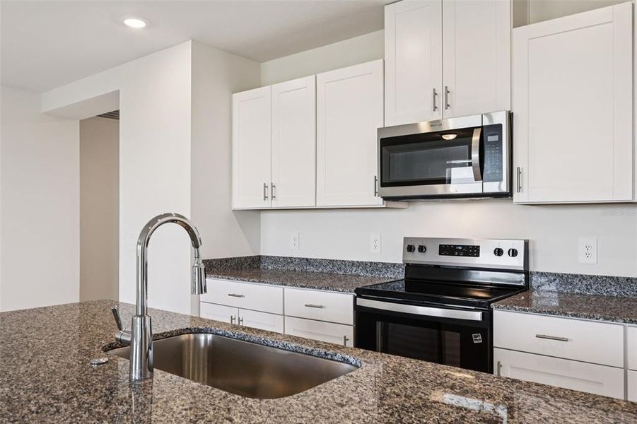 Furnished interior view inside a new home in Lake Deer Estates - Signature Series, Poinciana (Image 8).