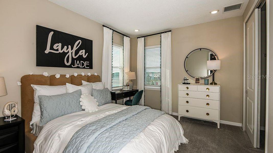 Furnished interior view inside a new home in Westview Community Group Page, Kissimmee (Image 11).