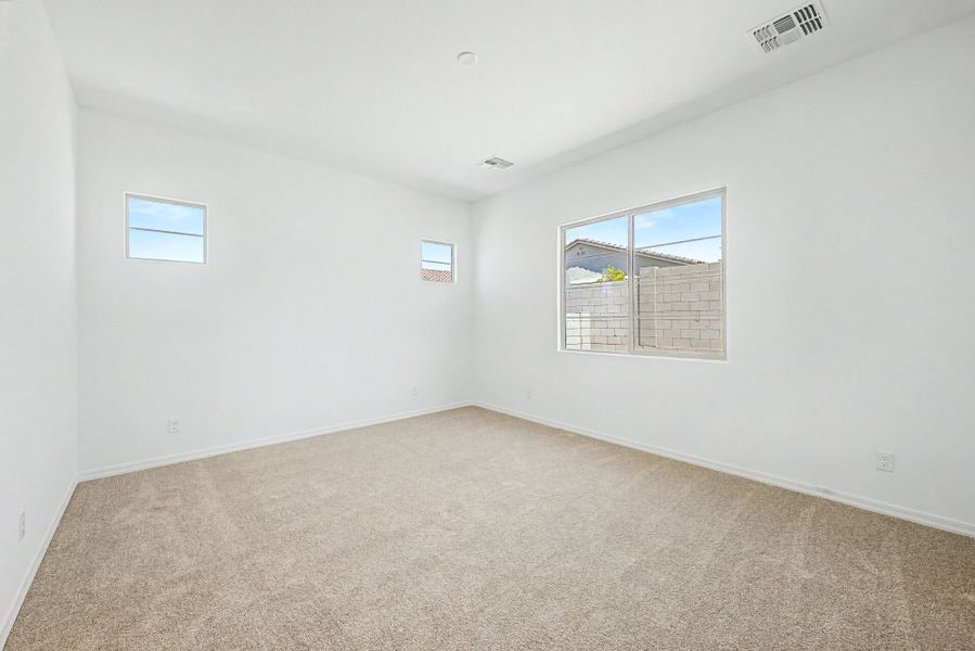 Spacious, unfurnished interior of a new home in Empire Pointe, Queen Creek (Image 10).