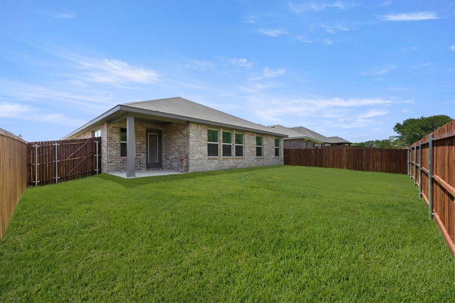 Front exterior of a new home in ValleyBrooke, Mesquite, TX, highlighting curb appeal (Image 27). Front exterior of a new home in ValleyBrooke, Mesquite, TX, highlighting curb appeal (Image 27).