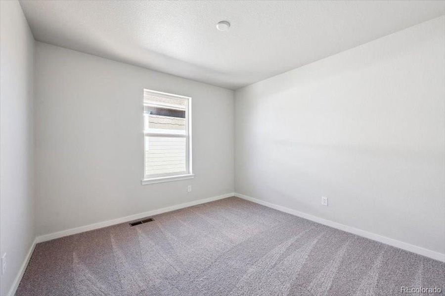 Spacious, unfurnished interior of a new home in The Haven Collection at Windler, Aurora (Image 15).