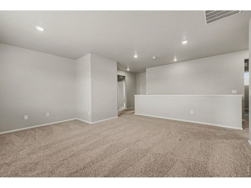 Spacious, unfurnished interior of a new home in Poudre Heights: The Alpine Collection, Windsor (Image 21).