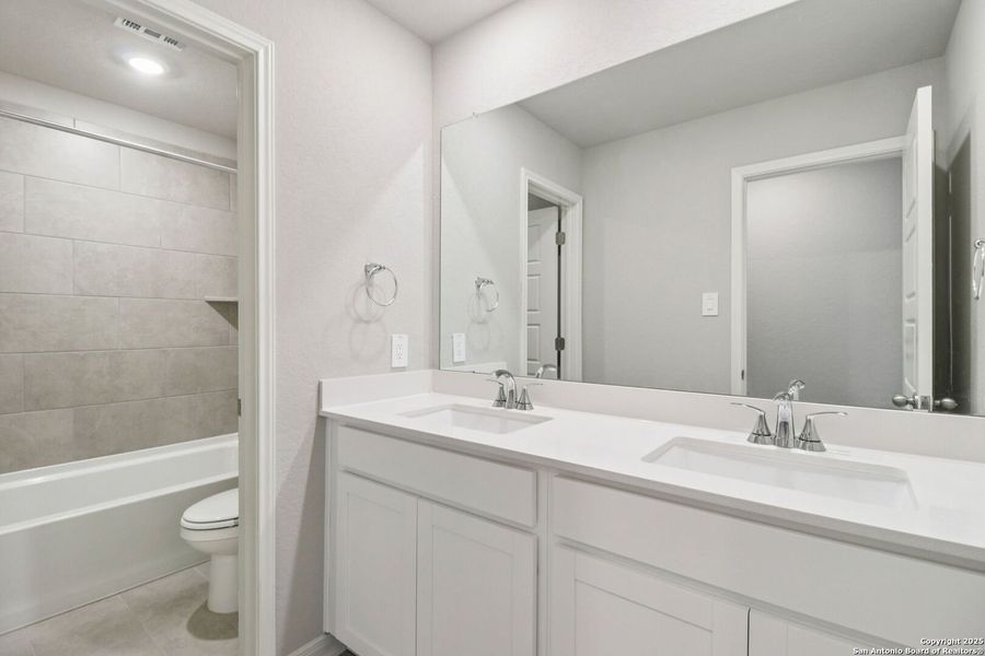 Furnished interior view inside a new home in Remington Ranch, San Antonio (Image 11).