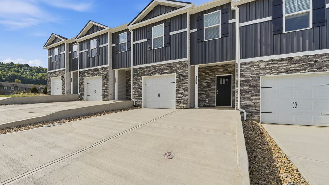 Front exterior of a new home in The Arbor Townhomes, Kingsport, TN, highlighting curb appeal (Image 13).