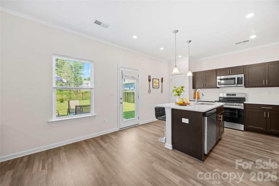 Furnished interior view inside a new home in Orchard Creek, Charlotte (Image 9).