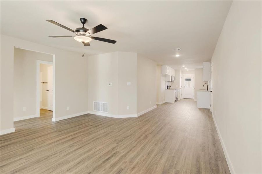 Spacious, unfurnished interior of a new home in Miller Street Cottages, Denison (Image 16).