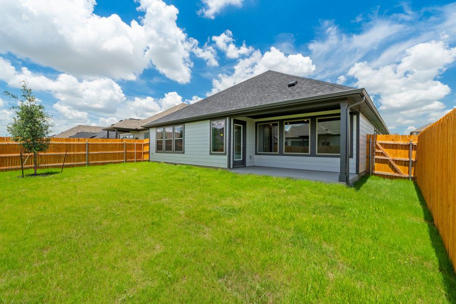 Exterior details and patio area of a home in Prairie Winds, Hutto (Image 25).
