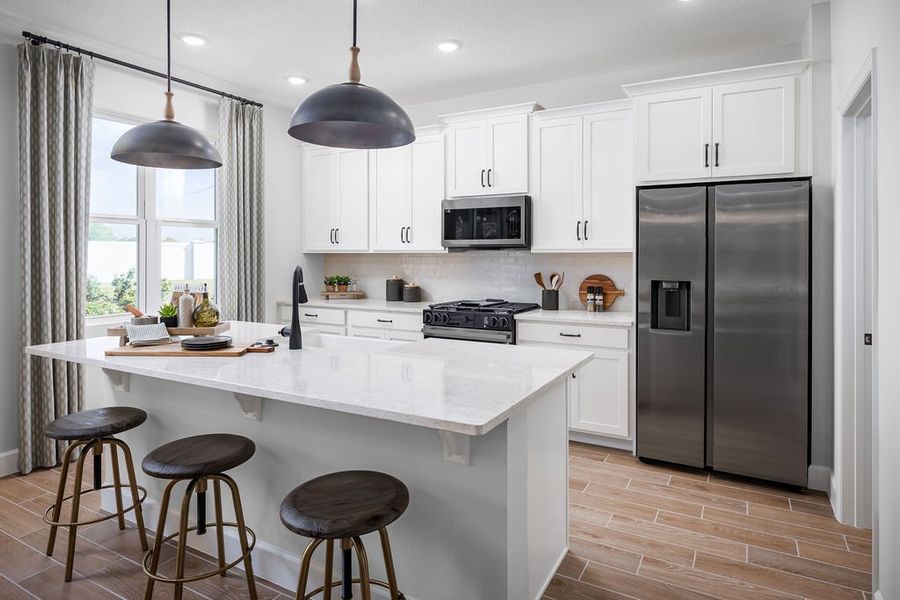 Representative furnished interior of a home built from the Magnolia by Risewell Homes in Oakview, Apopka (Image 15).