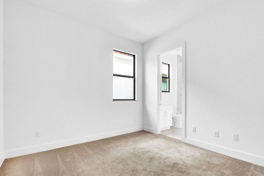 Spacious, unfurnished interior of a new home in Cove Royale, Stuart (Image 17).