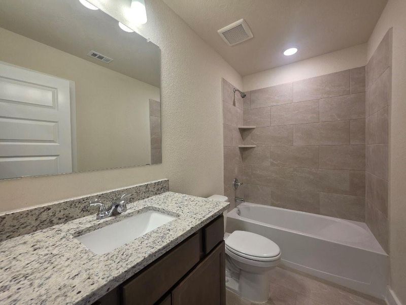 Furnished interior view inside a new home in , Brenham (Image 5).
