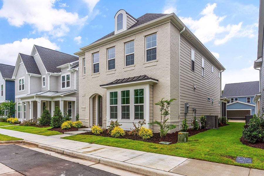 Representative exterior photo of a completed home built from the The Wisteria by RobuckHomes in East & Mason, Wilmington, NC (Image 28).