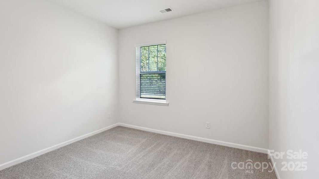 Spacious, unfurnished interior of a new home in Wallace Springs, Statesville (Image 13).