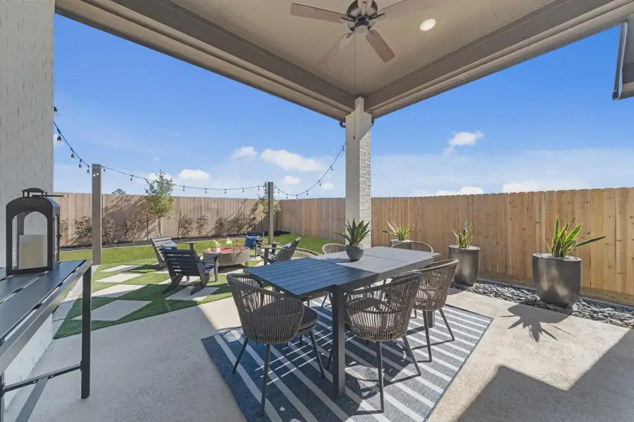 Representative exterior details of a home built from the Hampton by Chesmar Homes in Meridiana 50's and 60's, Manvel (Image 4).