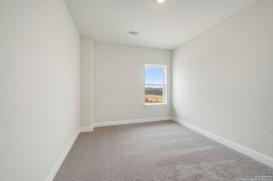 Spacious, unfurnished interior of a new home in Windsong - Reserve Series, Boerne (Image 49).