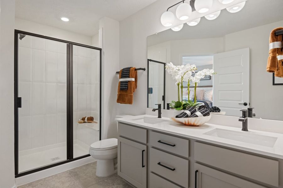 Dual-sink vanity at primary bath