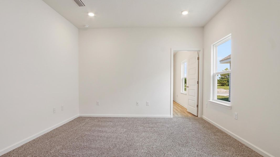 Representative unfurnished interior of a home built from the Cary by D.R. Horton in Owl's Head East, Freeport (Image 18). Representative unfurnished interior of a home built from the Cary by D.R. Horton in Owl's Head East, Freeport (Image 18).